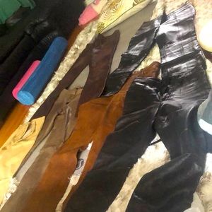 Sold designer leather pants . All are worn but lots of wear 4- 6